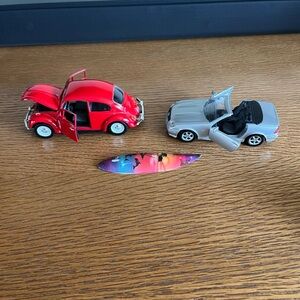 Red Volkswagen and Silver Mercedes Classic Toy Cars with Surfboard